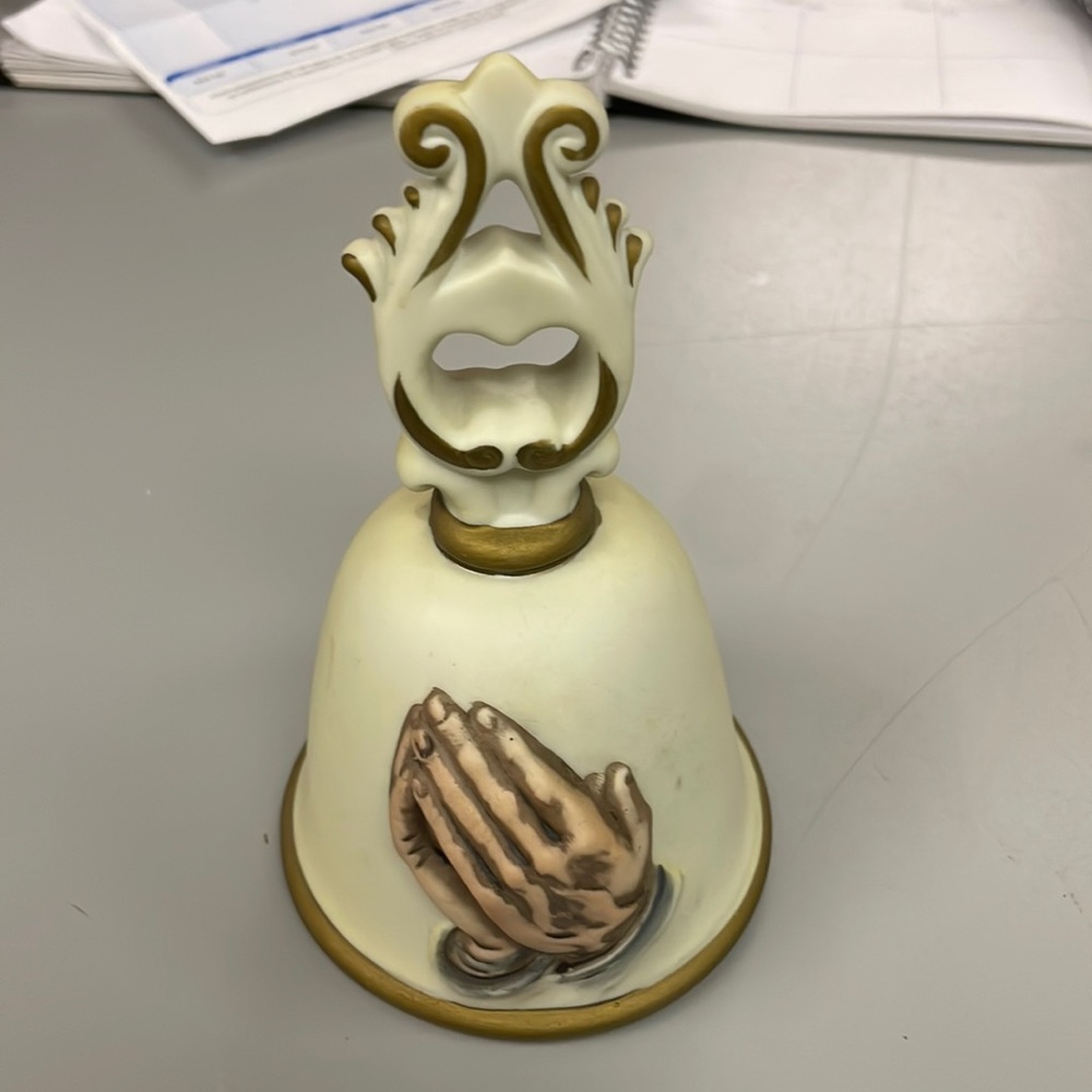 Jesus hands bell
